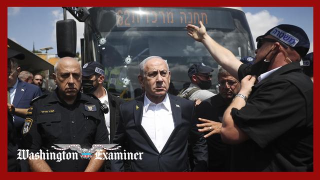 Palestinian attackers open fire at Jerusalem bus stop, killing six