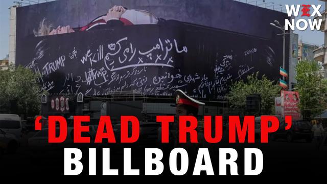 Tehran billboard shows a dead Trump and references to destroyed Minab school