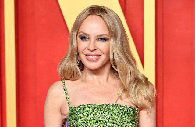 Kylie Minogue denies rumours of her appearing on Madonna's album Confessions II